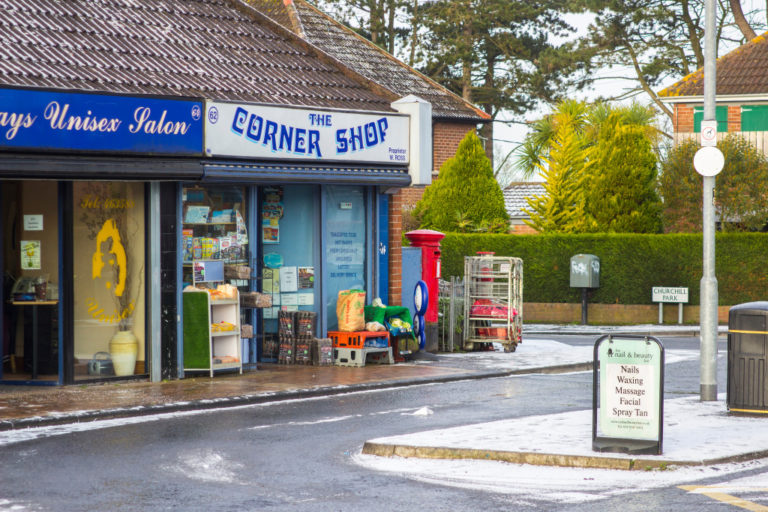 Small convenience store beside salon