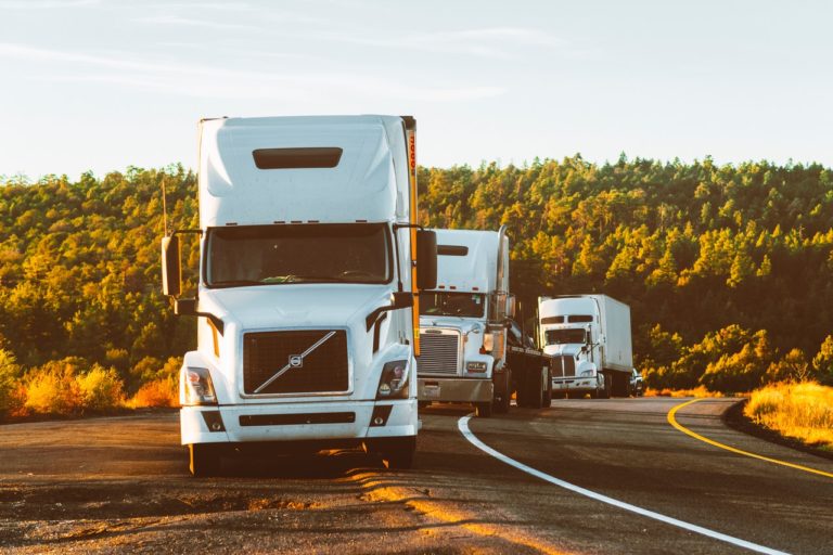 a fleet of trucks on the road