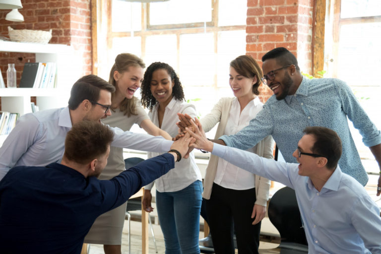 employees in a huddle