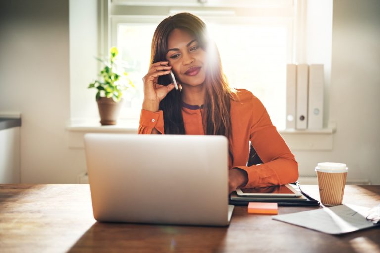 A woman working from her home office